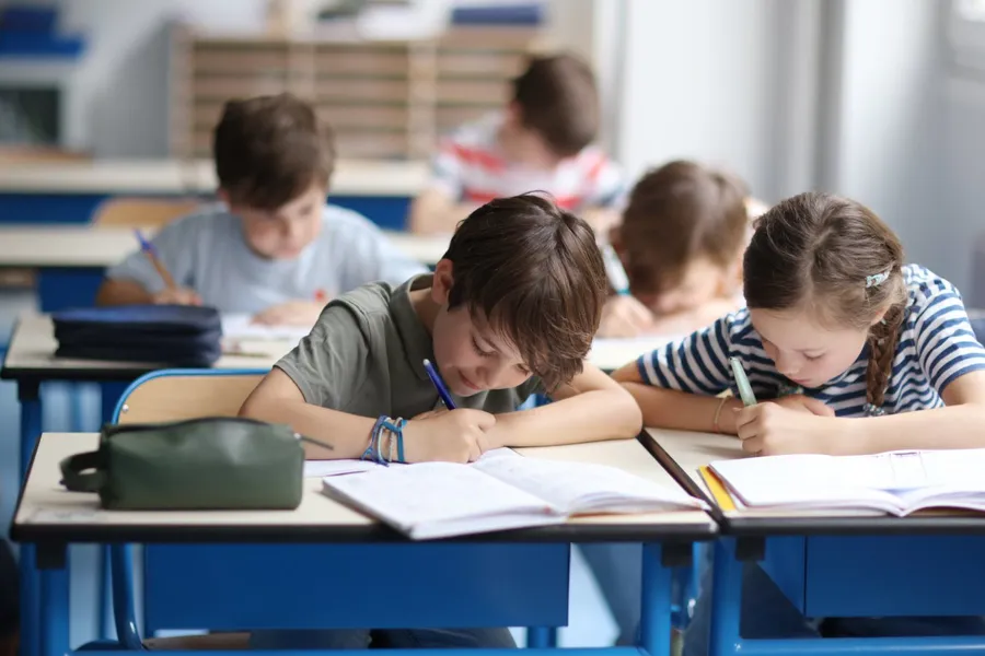 AI-generated writing samples for KS2 literacy: UK DfE pilot cuts costs but raises ethical concerns